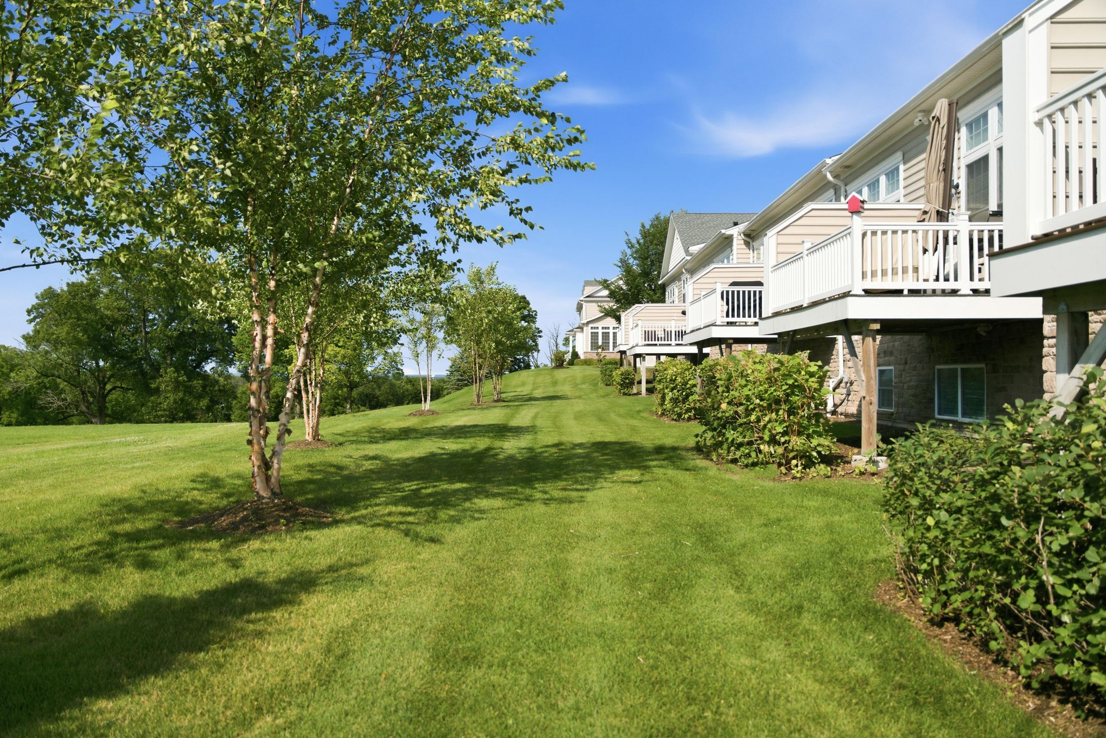 landscaped grounds and private balcony at 1 Aldrich Court